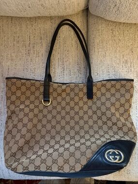 REPOSHING Gucci Brown GG Canvas Tote with Black Leather Trim